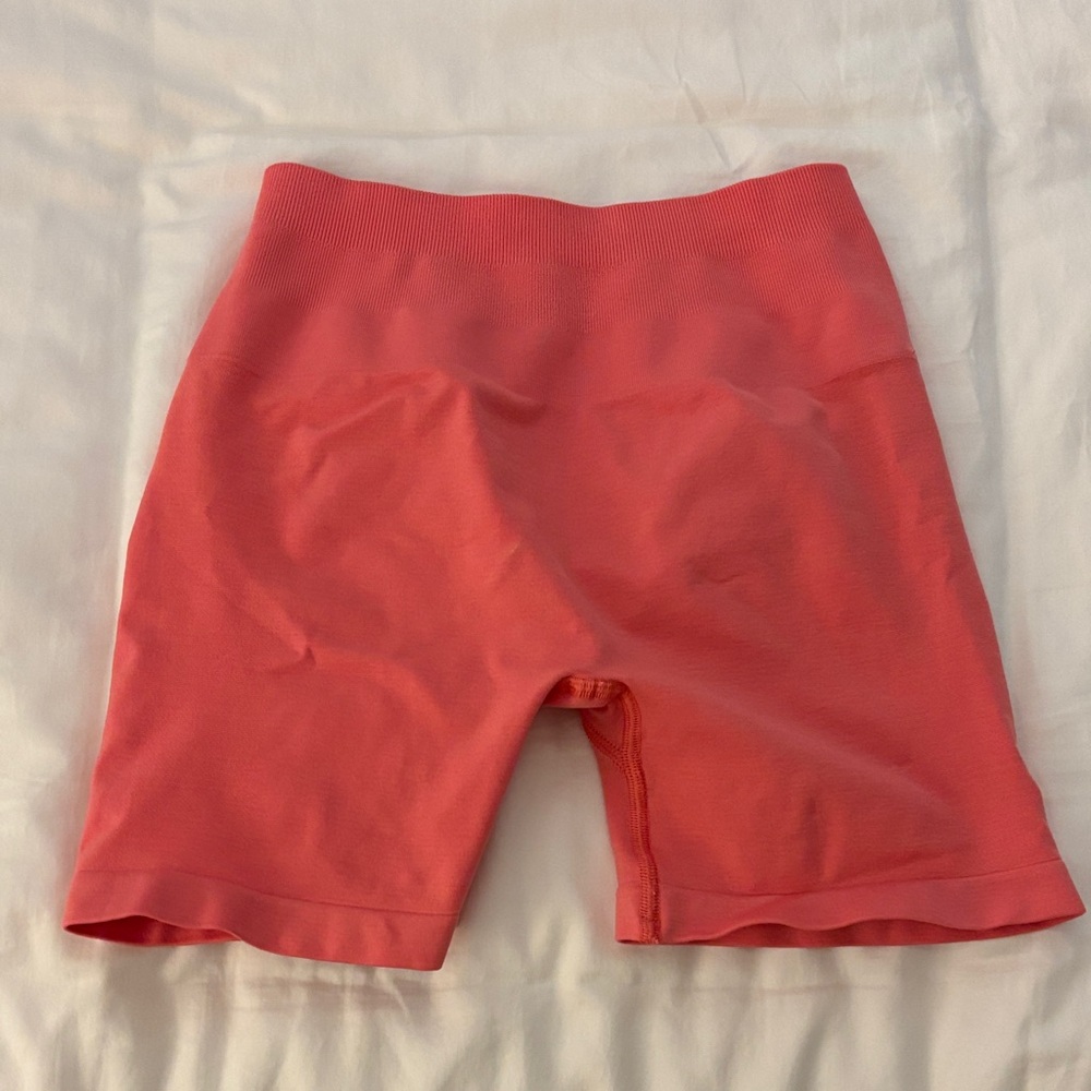Alphalete Amplify 4.5” shorts in pixel pink